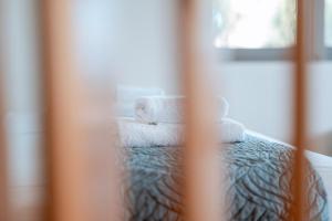 A bed or beds in a room at Villa Athina