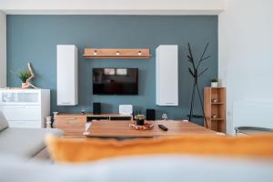 A television and/or entertainment centre at Villa Athina