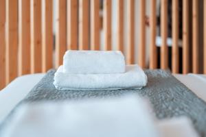A bed or beds in a room at Villa Athina