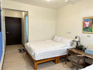 鰆居Chun House 三仙台房間的床
