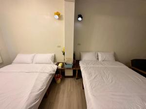 鰆居Chun House 三仙台房間的床
