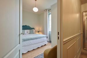 Boutique Hôtel Château Beaupin Restaurant & Wellness客房内的一张或多张床位