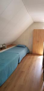 Voodi või voodid majutusasutuse Vakantiehuis Drents-Friese Wold toas