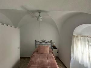 Łóżko lub łóżka w pokoju w obiekcie Casa Villanueva de Córdoba