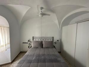 Łóżko lub łóżka w pokoju w obiekcie Casa Villanueva de Córdoba