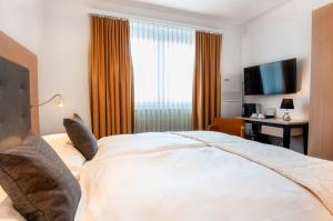 Katil atau katil-katil dalam bilik di Hotel Polo