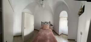 Łóżko lub łóżka w pokoju w obiekcie Casa Villanueva de Córdoba