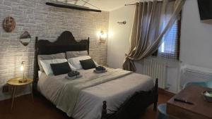 A bed or beds in a room at Stenghe Stracche