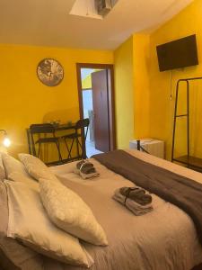 A bed or beds in a room at Stenghe Stracche