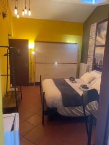 A bed or beds in a room at Stenghe Stracche