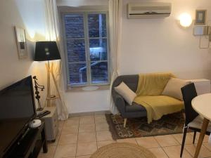 Posedenie v ubytovaní Appartement chic & cosy, cœur de ville Perpignan