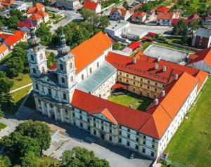 an overhead view of a building with an orange roof at Ubytovanie KAMENICA 