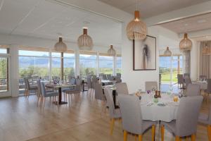 Um restaurante ou outro lugar para comer em Hotel Hamar