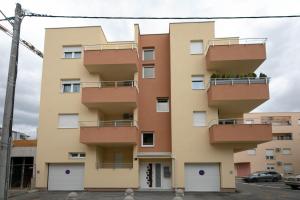 a building with balconies on the side of it at New & Modern smart HOME, FREE parking in Zagreb