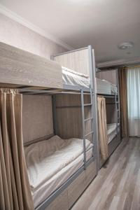 a bunk bed with two bunk beds in a room at 1001-NOCH in Tashkent +33 photos