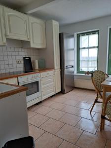 Køkken eller tekøkken på Schlafen im Hafen Stralsund