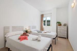 Ένα ή περισσότερα κρεβάτια σε δωμάτιο στο Apartment Happy - PlusHolidays +28 φωτογραφίες