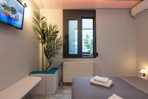 Postel nebo postele na pokoji v ubytování Rithian Blue Coast 2 bedroom seaview apartment + 37 fotografií