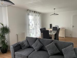 Posedenie v ubytovaní appartement vacances en copropriété avec parking