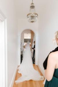 a bride is getting ready for her wedding at LUCAS Street in Kingston