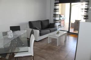 Część wypoczynkowa w obiekcie Appartement tout confort, Rez-de chaussée,3 chambres, 2 salles de bain