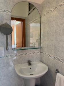 Koupelna v ubytování Hotel Ambra