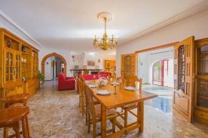 a dining room with a table and chairs at Villa Lina - PlusHolidays in Calpe