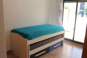 Łóżko lub łóżka w pokoju w obiekcie Appartement tout confort, Rez-de chaussée,3 chambres, 2 salles de bain