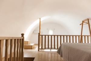 Llit o llits en una habitació de Astro Palace Hotel & Suites