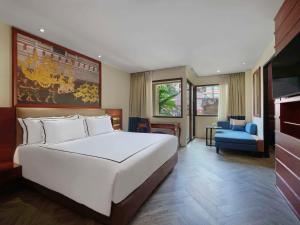 Postel nebo postele na pokoji v ubytování Novotel Phuket Vintage Park Resort