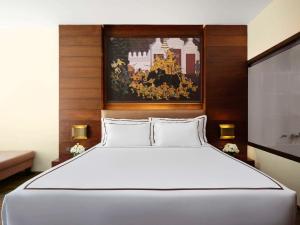 Postel nebo postele na pokoji v ubytování Novotel Phuket Vintage Park Resort