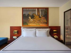 Postel nebo postele na pokoji v ubytování Novotel Phuket Vintage Park Resort