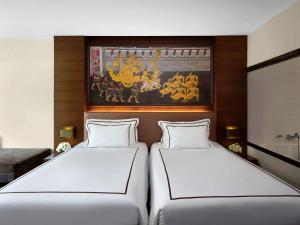 Postel nebo postele na pokoji v ubytování Novotel Phuket Vintage Park Resort