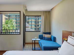 Postel nebo postele na pokoji v ubytování Novotel Phuket Vintage Park Resort