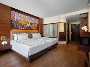 Postel nebo postele na pokoji v ubytování Novotel Phuket Vintage Park Resort