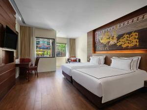 Postel nebo postele na pokoji v ubytování Novotel Phuket Vintage Park Resort