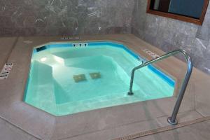 a swimming pool in the middle of a room at Wingate by Wyndham Eagle Vail Valley in Eagle