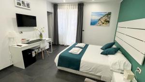Postel nebo postele na pokoji v ubytování Soave Rooms