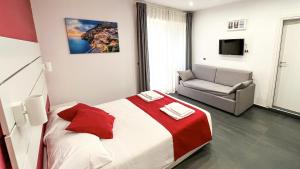 Postel nebo postele na pokoji v ubytování Soave Rooms