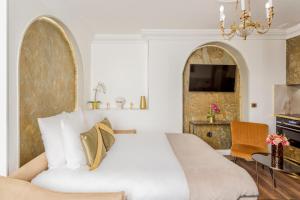מיטה או מיטות בחדר ב-Luxury 2 bedrooms Apartment - Louvre Museum