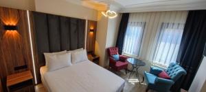 Postel nebo postele na pokoji v ubytování Star Hotel