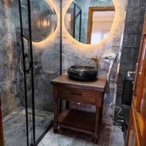 a bathroom with a sink and a mirror at Star Hotel in Istanbul