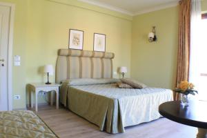 Postel nebo postele na pokoji v ubytování Il Parco Sul Mare Resort & SPA + 37 fotografií