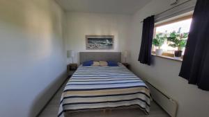 Postel nebo postele na pokoji v ubytování Pärnu Tulbi