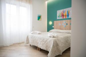 En eller flere senge i et værelse på B&B DieMme Amalfi Coast