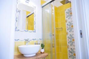 a bathroom with a sink and a shower at B&B DieMme Amalfi Coast in Vietri sul Mare