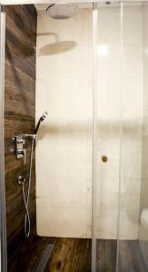 a shower in a bathroom with a glass door at KURT SAFİR EURO 20 RESIDENCE NO:15 in Alanya