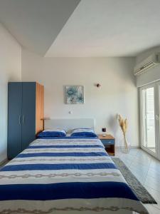 Łóżko lub łóżka w pokoju w obiekcie Apartments Marija Magdalena