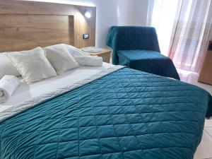 Ένα ή περισσότερα κρεβάτια σε δωμάτιο στο Guest House-MD