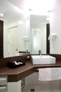 Ванная комната в Queens Hotel Angeles City